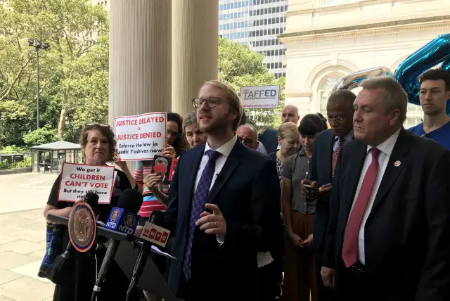 Naftuli Moster, executive director of Yaffed, at a rally on Wednesday at City Hall to demand the de Blasio administration ensure that yeshiva students recent an adequate education.